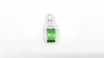 Clear plastic ecg adapter clip with bright green internal component and black terminal ends for secure electrical connection
