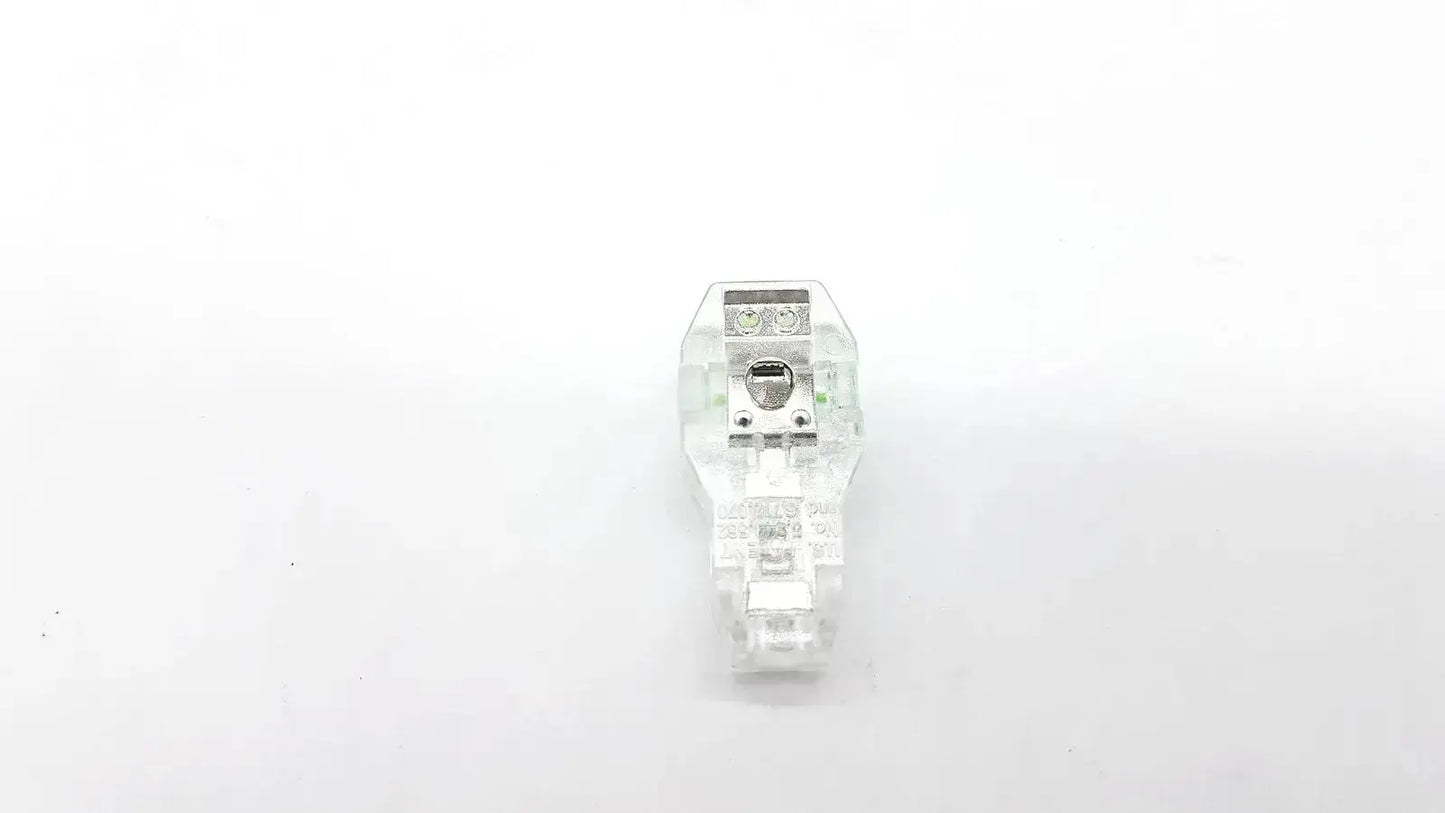 Clear plastic ecg adapter clip 2056813-014 rev a with metallic terminals for reliable electrical connections