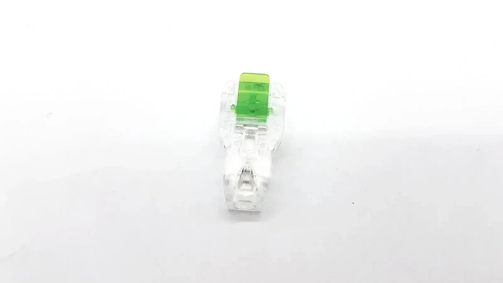Clear plastic ecg adapter clip with bright green rectangular insert model 2056813-014 rev a for secure connections