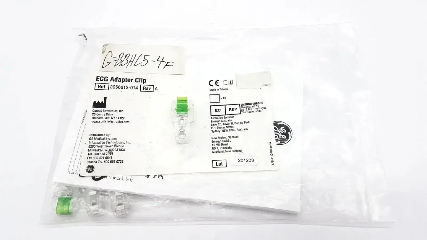 Green plastic ecg adapter clip 2056813-014 rev a sealed in medical packaging bag for medical device use