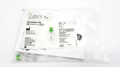Green plastic ecg adapter clip 2056813-014 rev a sealed in medical packaging bag for medical device use