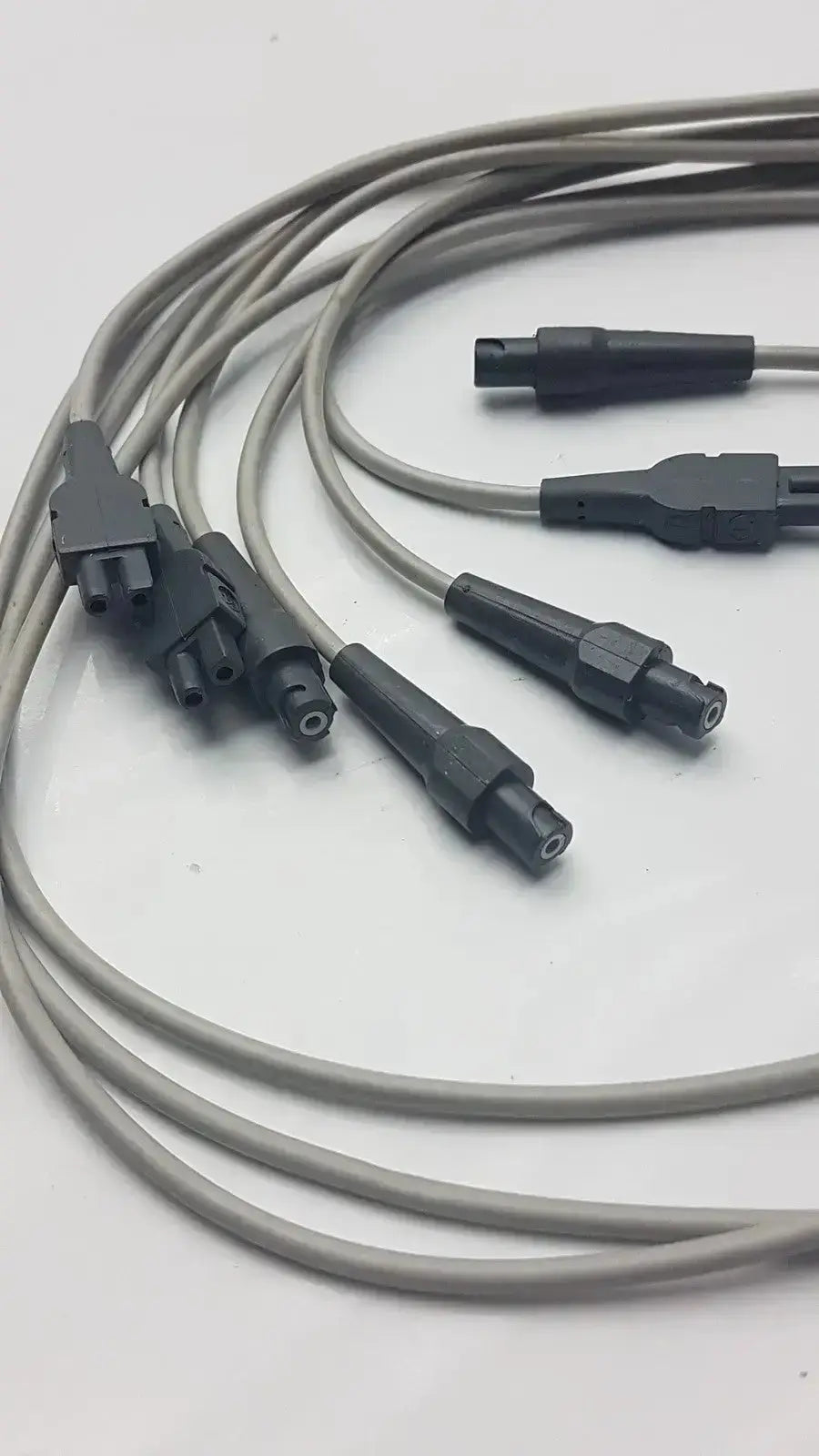 Gray coaxial ecg leadwire set cable with black plastic connectors for vital signs diagnostic cardiology use
