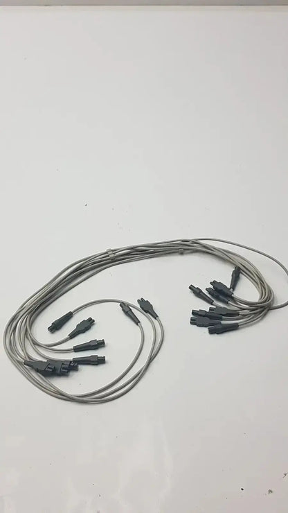 Gray fiber optic ecg leadwire set cable with multiple black connector ends for universal vital signs diagnostics