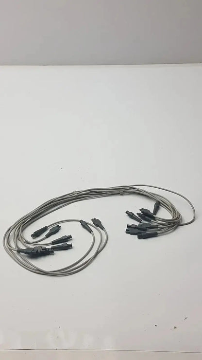Gray fiber optic ecg leadwire set cable with multiple black connector ends for vital signs diagnostic cardiology use