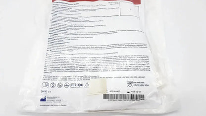 White paper label with black text on the back of ecolab ors-300 warmer drape exp showing instructions and barcode