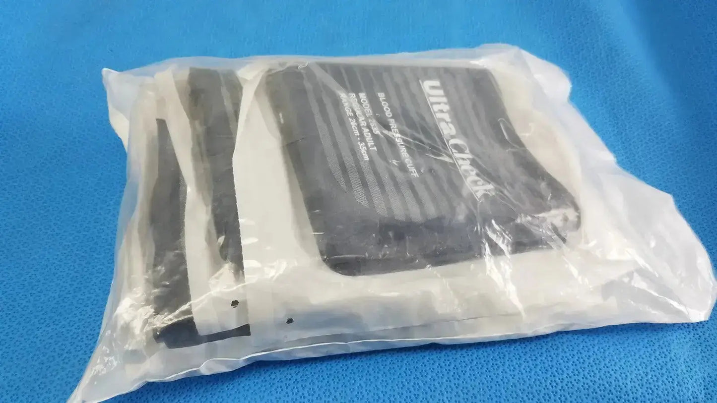 Black and white Edan vital signs monitor packaging sealed in clear plastic for medical device protection