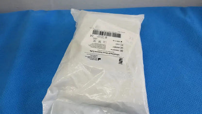 A white sterile surgical drape in clear packaging with printed labeling for edan vital signs monitor use