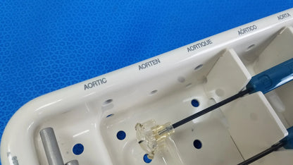 White plastic surgical tray with labeled compartments for aortic instruments in edwards life science 1111 perimount sizer set for buy used medical equipment
