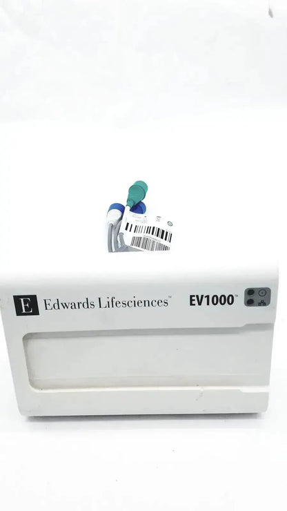 White plastic box labeled edwards lifesciences ev1000 with a small medical device and cables on top lifesciences ev1000 databox