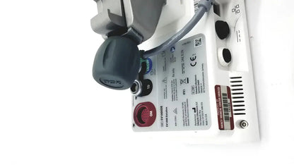 White edwards lifesciences ev1000 databox with gray and black components featuring red on button and multiple ports