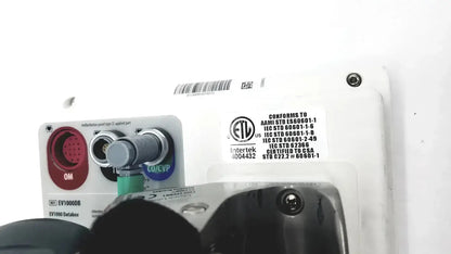 White plastic industrial control panel with red and blue buttons and connectors on edwards lifesciences ev1000 databox