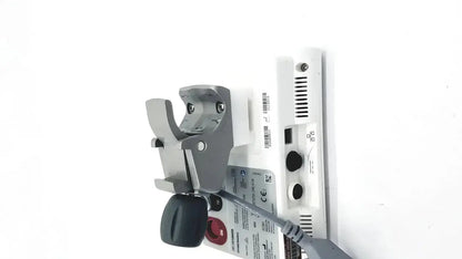 Gray and white edwards lifesciences ev1000 databox medical device with black handle showing ports and ventilation slots on back side