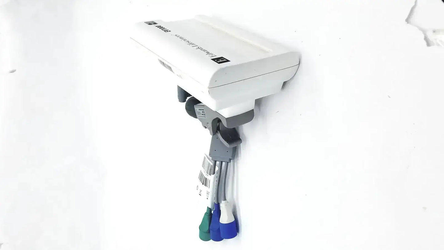 White hp laserjet printer with gray mounting bracket and colored cables shown on back of edwards lifesciences ev1000 databox