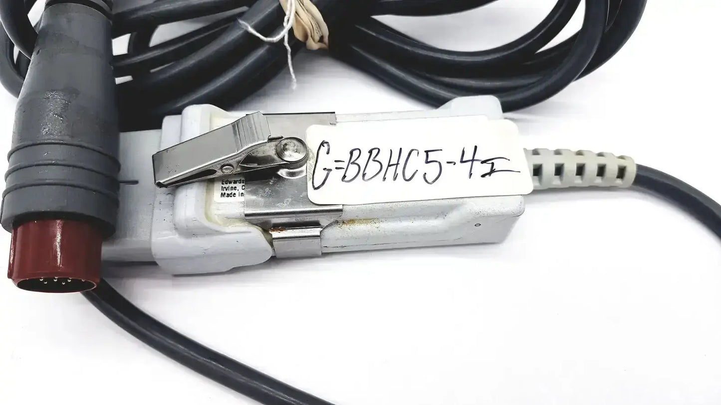 Gray plastic edwards lifesciences om2 oximetry optical module cable adapter with black cables and red connector labeled g=bbhc5-4
