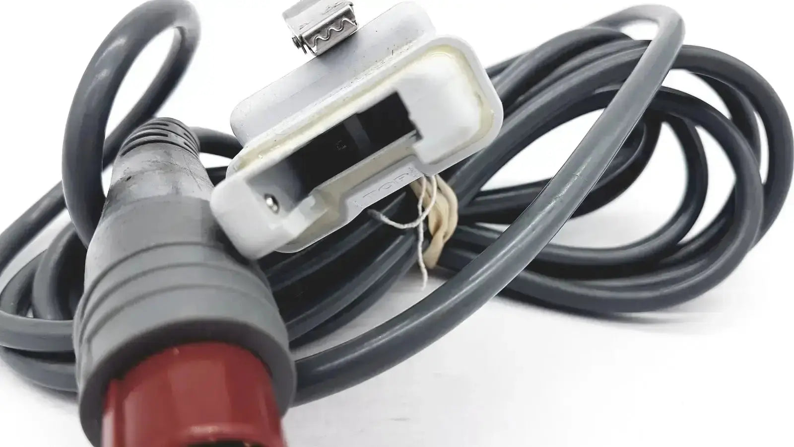 Black coiled power cord with red and gray connector and white housing for Edwards Lifesciences OM2 oximetry optical module cable