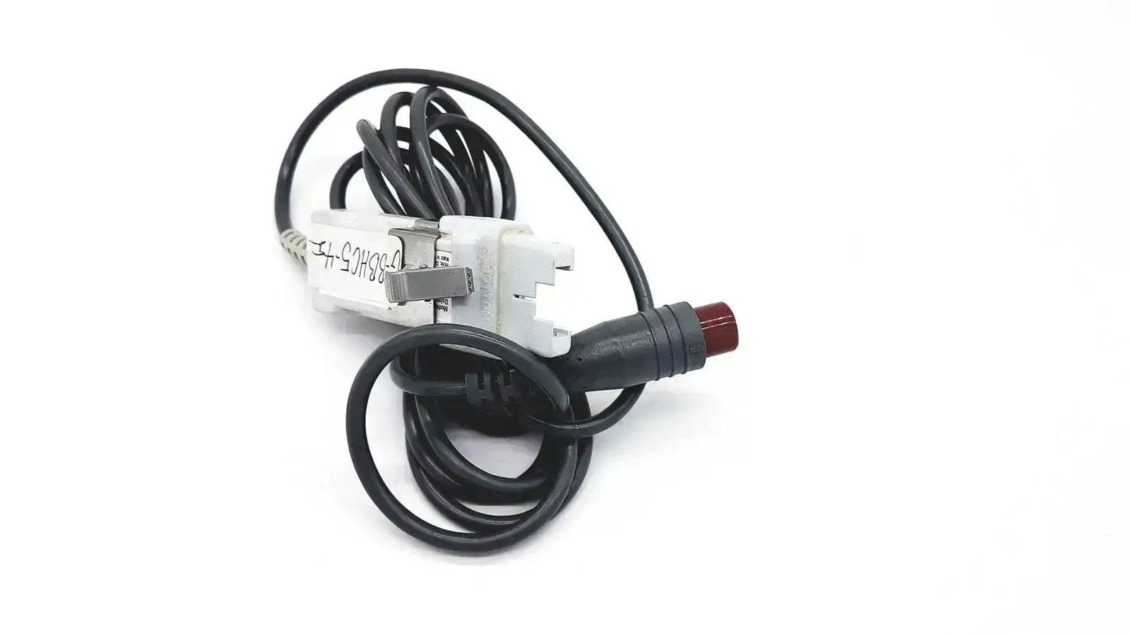Black coiled edwards lifesciences om2 optical module cable with white plastic housing and red connector for oximetry use