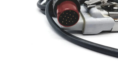 Red and black edwards lifesciences om2 oximetry optical module cable adapter with circular array of metallic pins