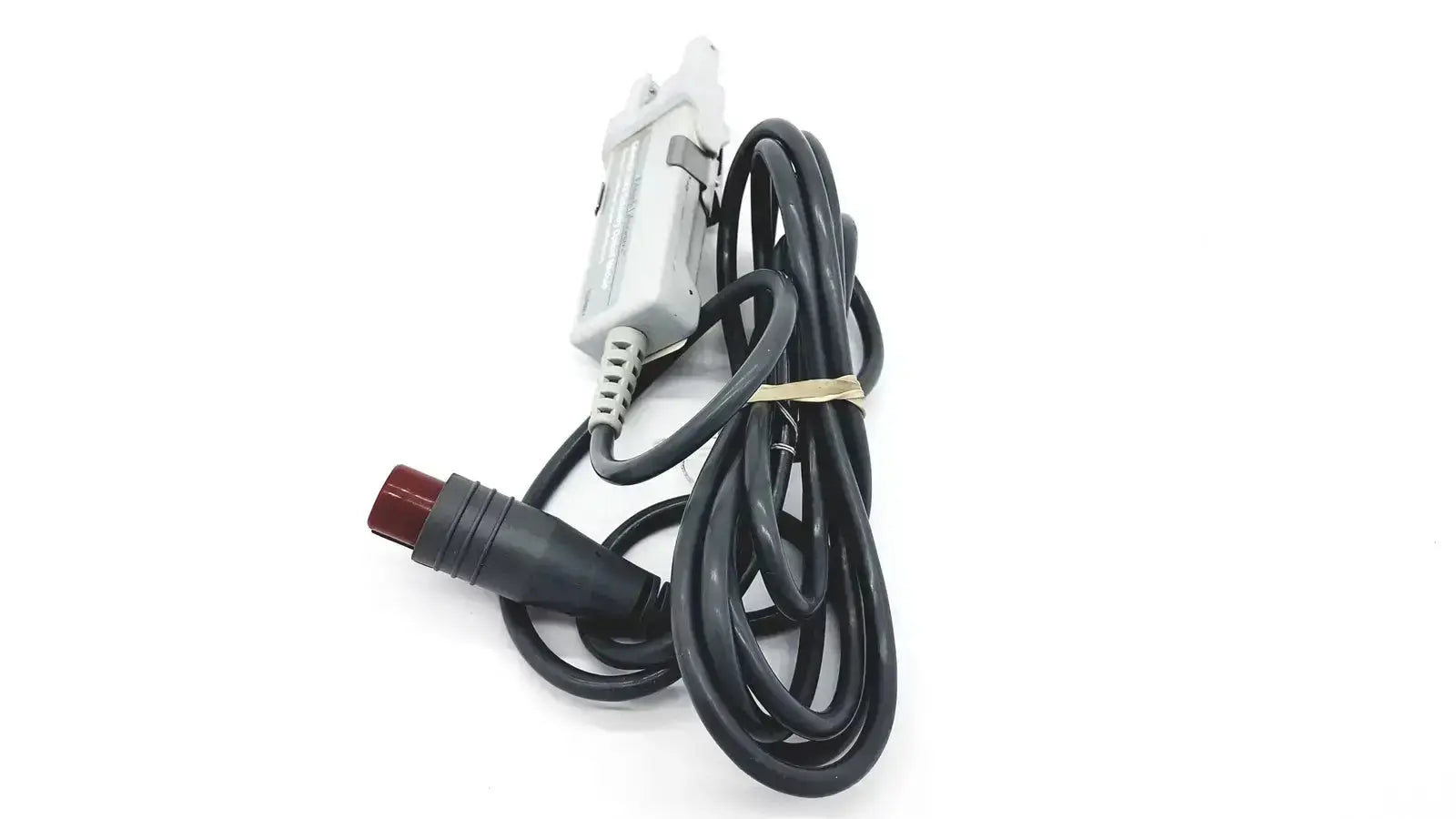 Black coiled edwards lifesciences om2 optical module cable with white connector housing and red-tipped plug
