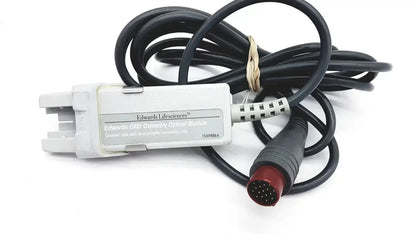 White plastic edwards lifesciences om2 oximetry optical module cable adapter with black coiled cable and red connector