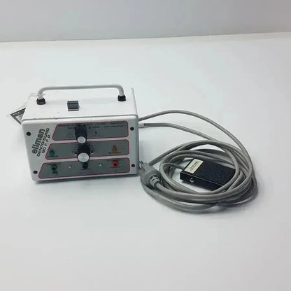 White ellman dento surg 90 ffp unit with black knobs red indicators handle and gray coiled cable patient ready