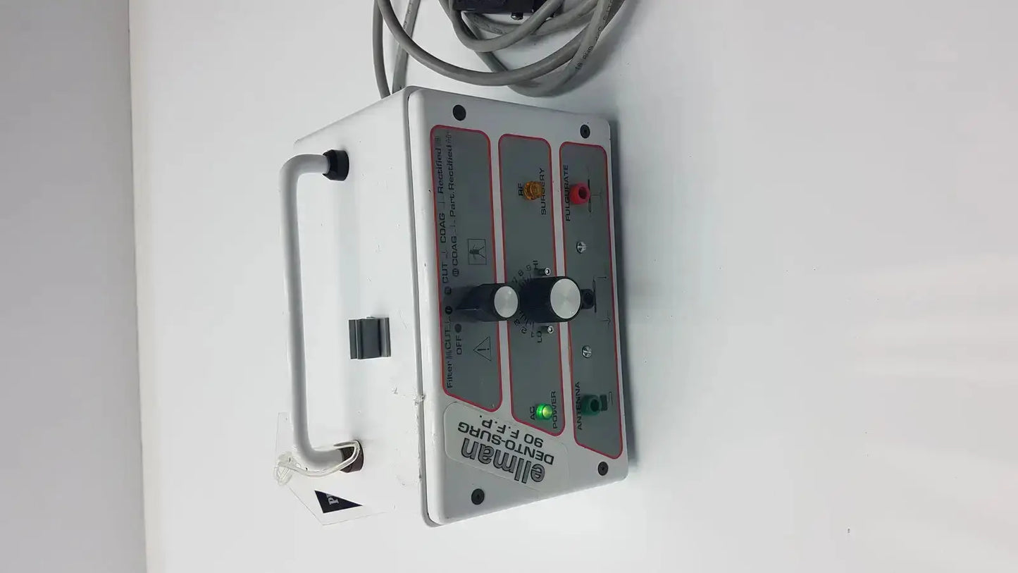 White rectangular ellman dento surg 90 ffp medical device with black handle and patient ready control panel indicators