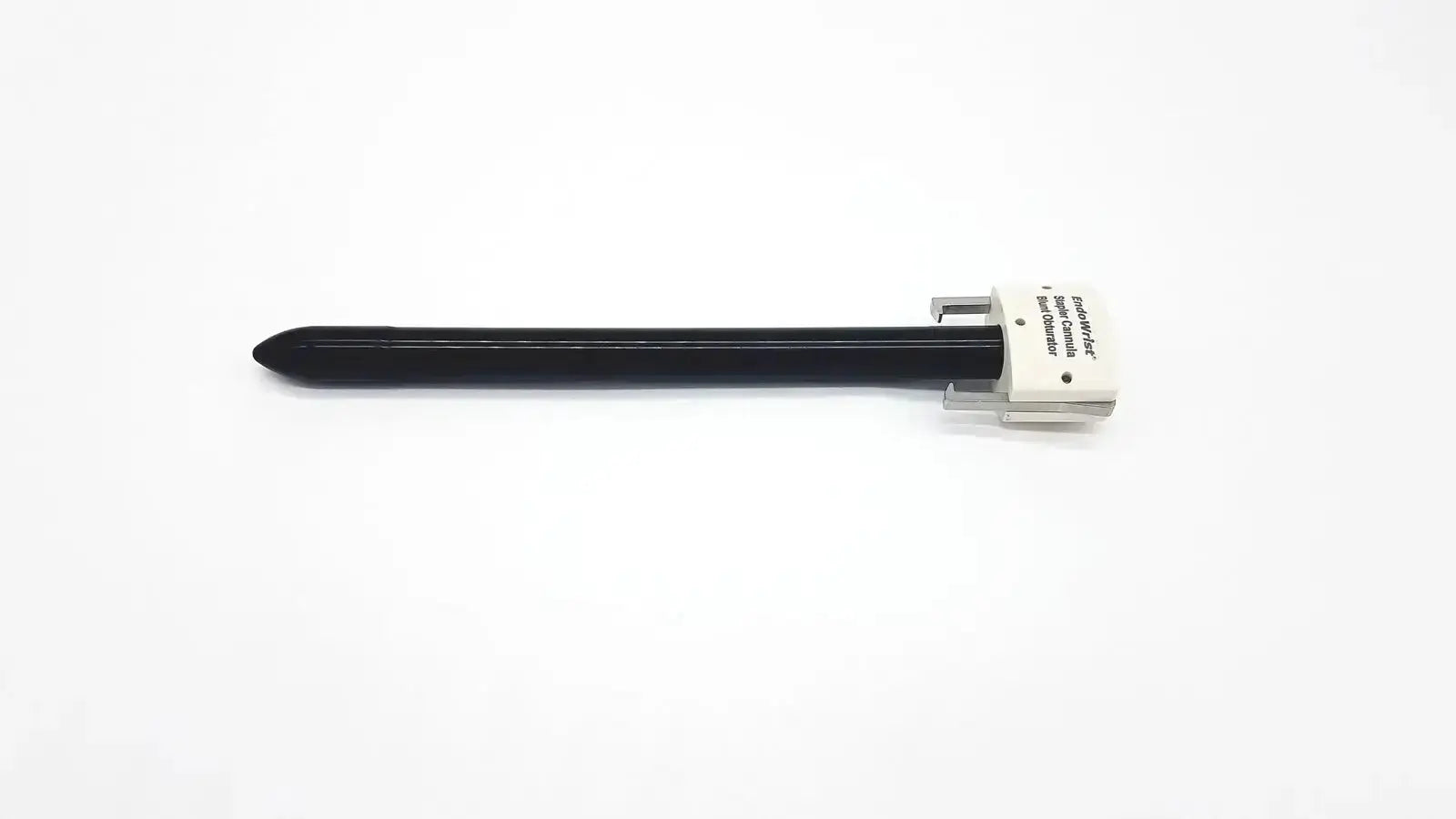 Endowrist stapler cannula blunt obturator featuring a black surgical suture needle with white plastic handle and metal clasp
