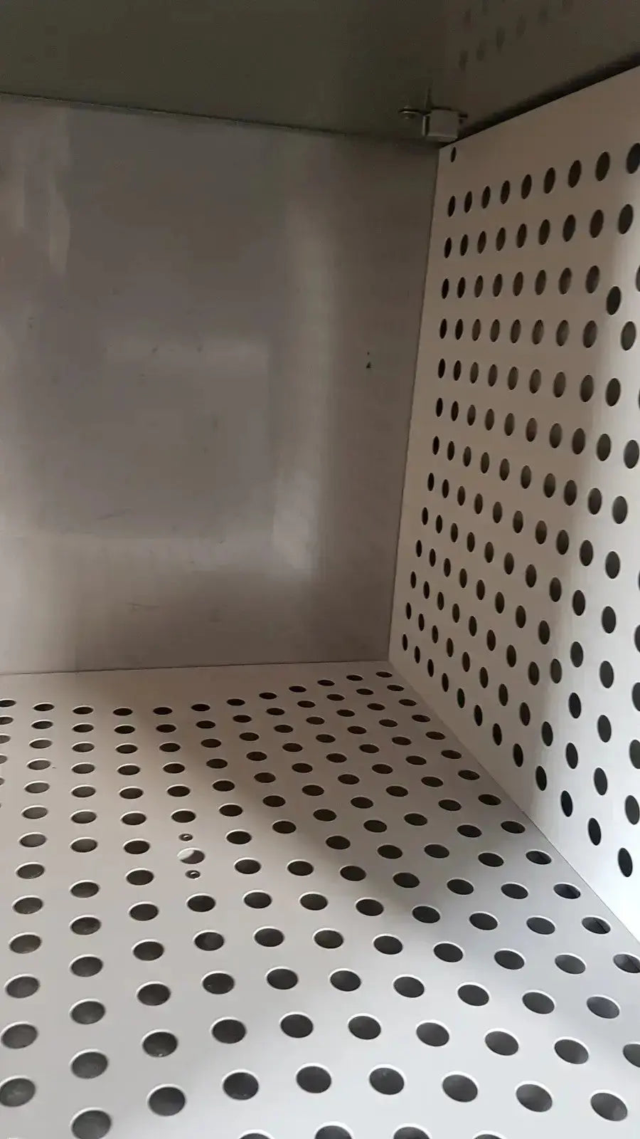 White perforated metal shelf with circular holes in enthermics blanket warming cabinet dc250 for efficient blanket warming