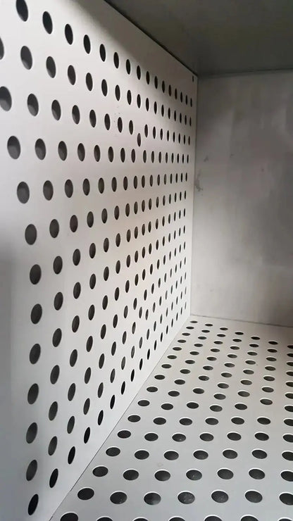 White perforated metal shelf panel with circular holes in enthermics dc250 blanket warming cabinet for uniform warming