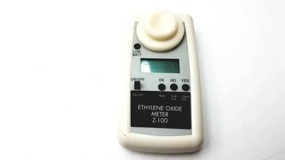 Cream-colored plastic handheld environmental sensors Z100 ethylene oxide meter with digital display and control buttons