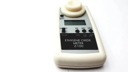 Cream-colored plastic environmental sensors Z100 ethylene oxide meter with digital display and control buttons for oxide measurement