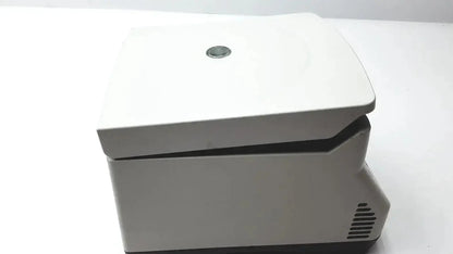 White laboratory centrifuge eppendorf 5424 with sleek modern design and black base for buy used medical equipment