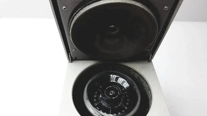 Black eppendorf 5424 centrifuge with circular rotor chamber and numerical lid markings available as pre owned medical equipment