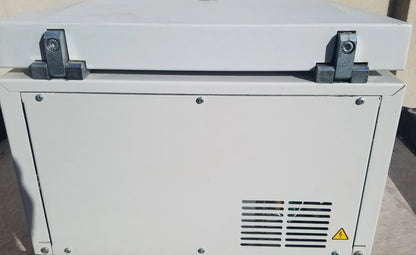 White industrial generator with metallic latches and vented panel on the back of eppendorf 5804 refrigerated benchtop centrifuge for buy used medical equipment
