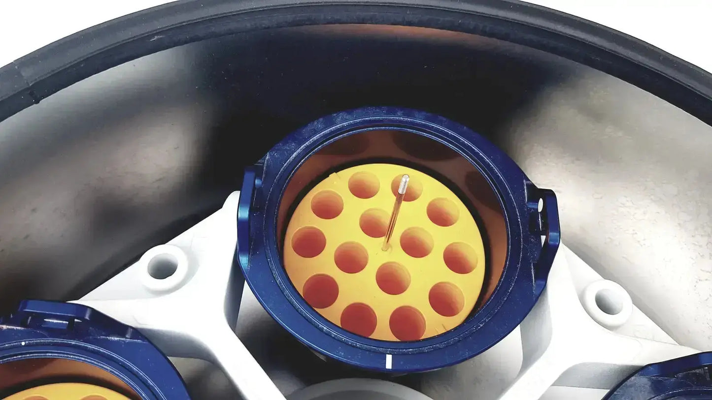 Blue circular connector housing with yellow insert and central pin on back of eppendorf centrifuge for biomedical technicians