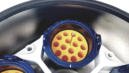 Blue circular connector housing with yellow insert and central pin on back of eppendorf centrifuge for biomedical technicians