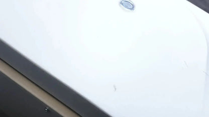White plastic car hood with small circular emblem on top center of eppendorf centrifuge 5810 for biomedical technicians