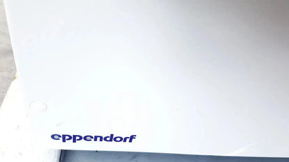 White eppendorf centrifuge 5810 container with minimalist design in dark blue print for biomedical technicians and hospital surplus
