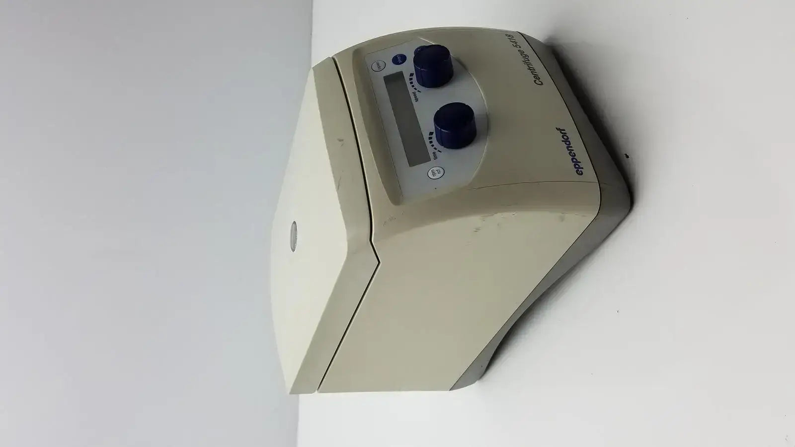 Beige and gray eppendorf model 5418 microcentrifuge with digital display and two black knobs used medical equipment for sale