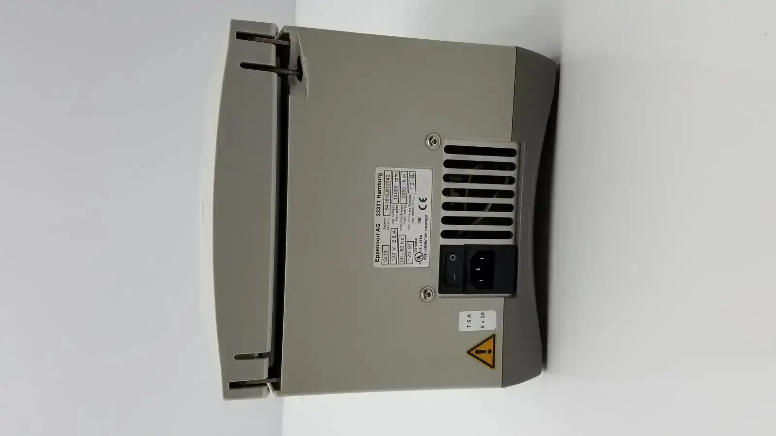 Gray industrial power supply unit with black ac input socket on the back of eppendorf model 5418 microcentrifuge used medical equipment for sale