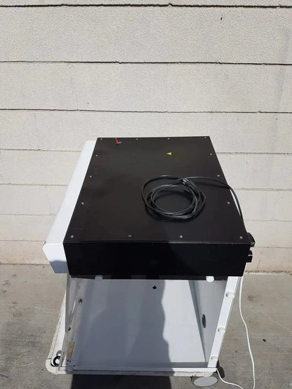 Black and white industrial-grade scanner with coiled cable on top for erlab captair bio chem filtair ductless filtering hood