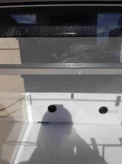 A cracked and scratched car windshield with condensation droplets illustrating damage, related to erlab captair bio chem filtair use
