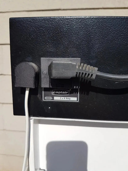 Black captain brand electrical outlet with two 4-amp plugs and textured surface for erlab captair bio chem filtair hood