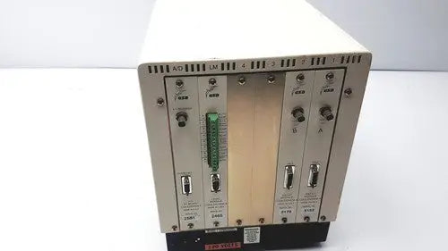 Silver metallic rack-mountable esa 5200a detector with green connector strip and multiple labeled ports for lab use