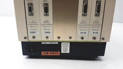 Metallic industrial control module of esa 5200a detector with four labeled slots by coulchem for electrochemical detection