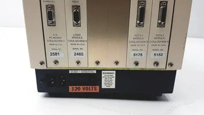 Metallic industrial control module of esa 5200a detector with four labeled slots by coulchem for electrochemical detection