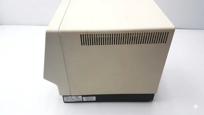 Beige plastic desktop microwave with black base and vertical slotted vent side for esa coulochem ii lab electrochemical detector 5200a