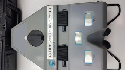Gray plastic essilor x81701 precision digital crp corneal reflection pupilometer with black knobs and labeled eye panels