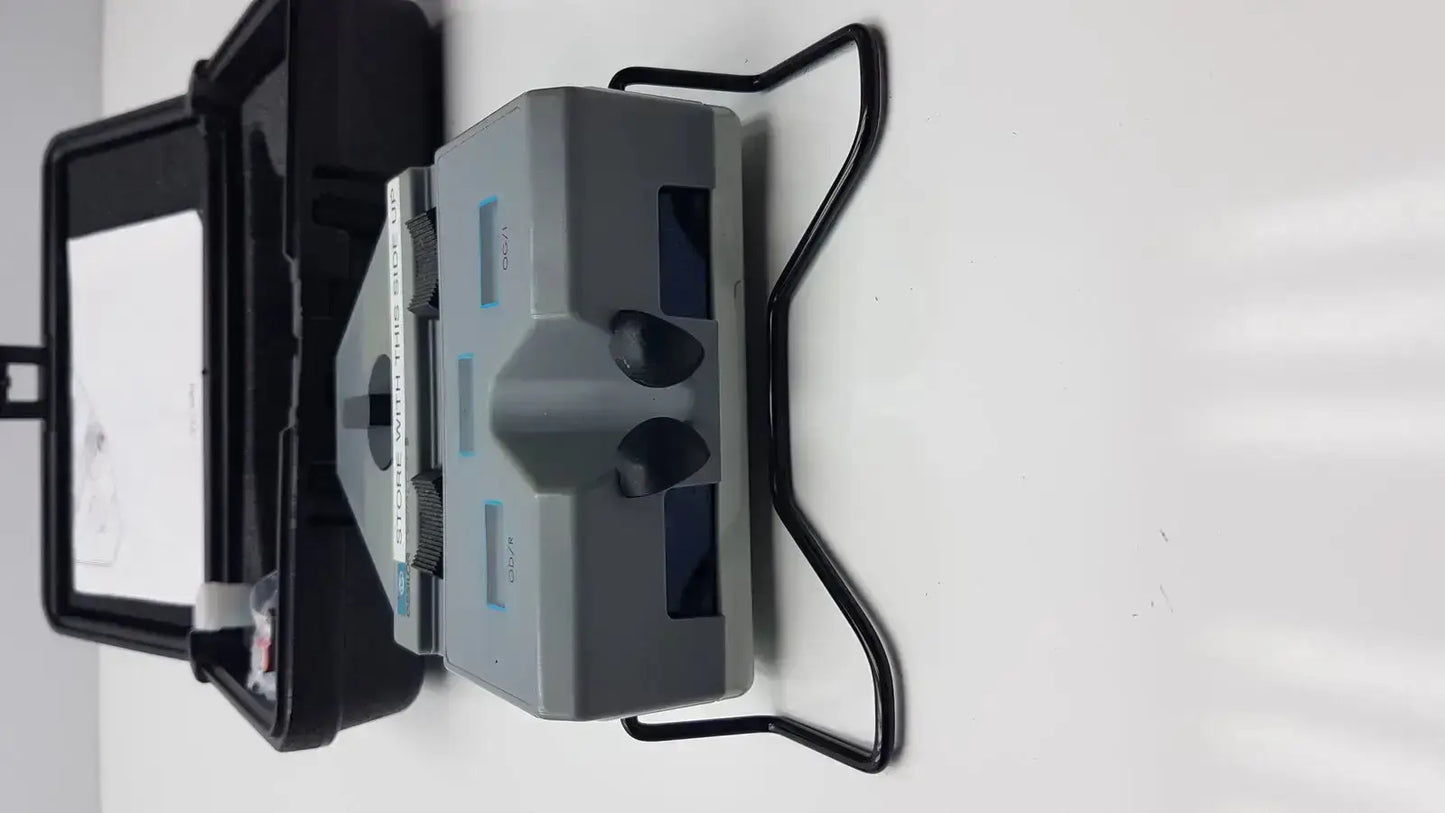 Essilor x81701 precision digital crp gray plastic dental curing light with black knobs and vertical scale on the side