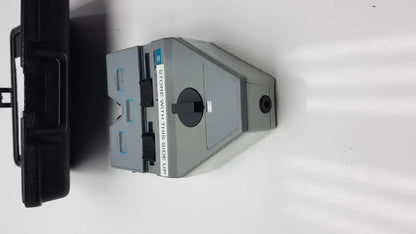 Gray plastic hp printer cartridge with black accents and circular dial for essilor x81701 precision digital crp device
