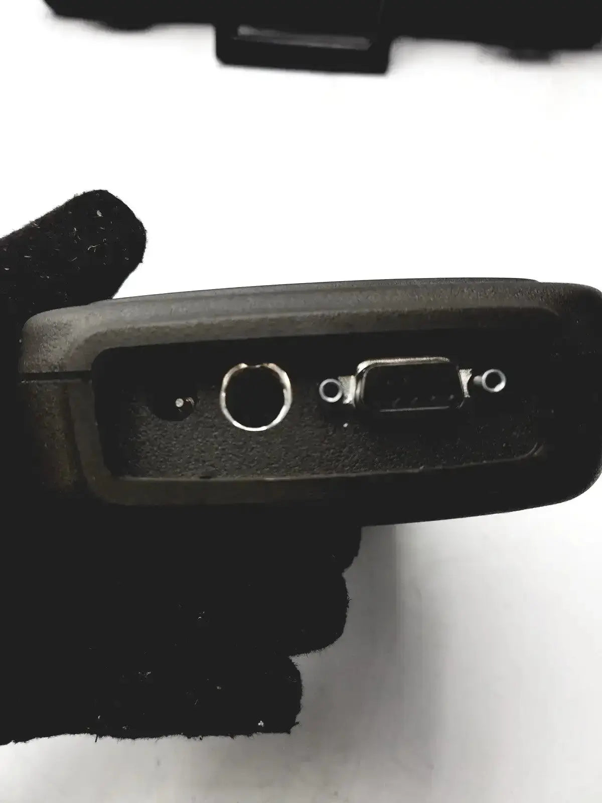 Black handheld eutechninc precision temperature 4500 thermo meter rear panel with circular port and rectangular connector